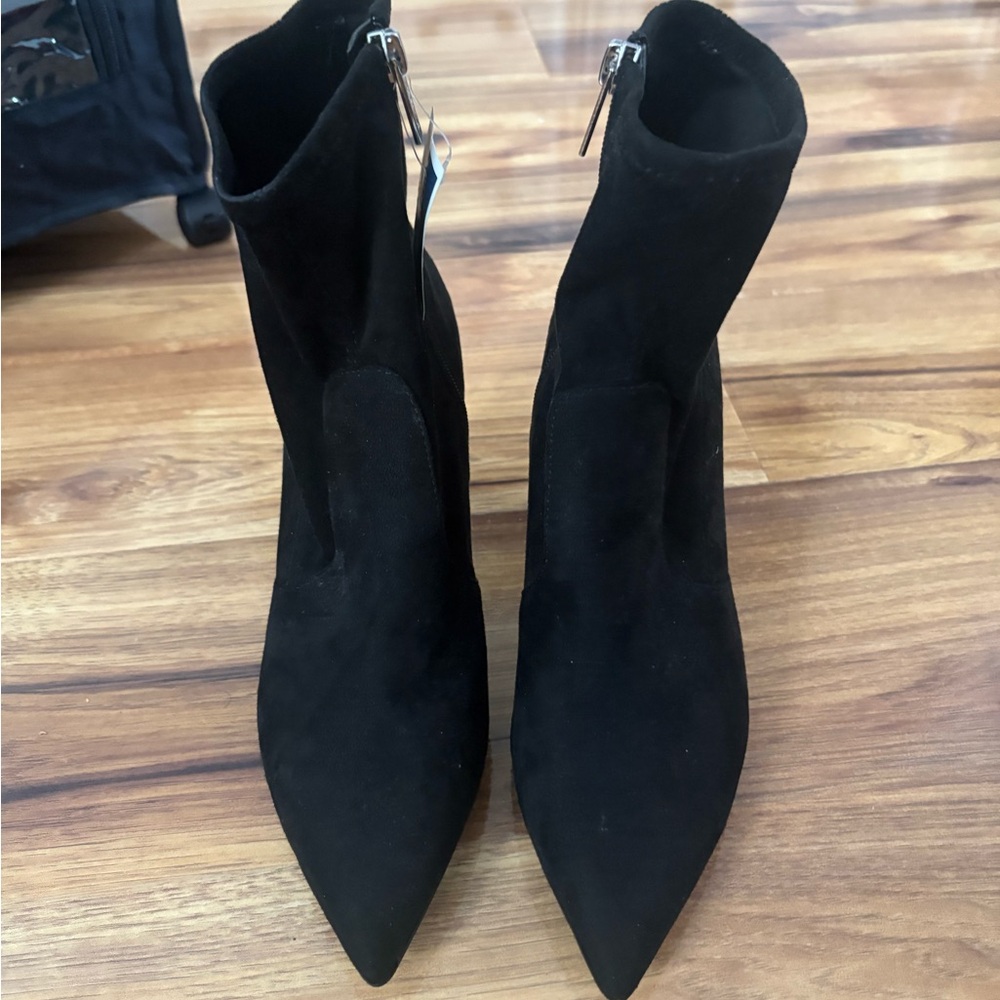 Marshalls Black Heeled Boots with Sleek Design